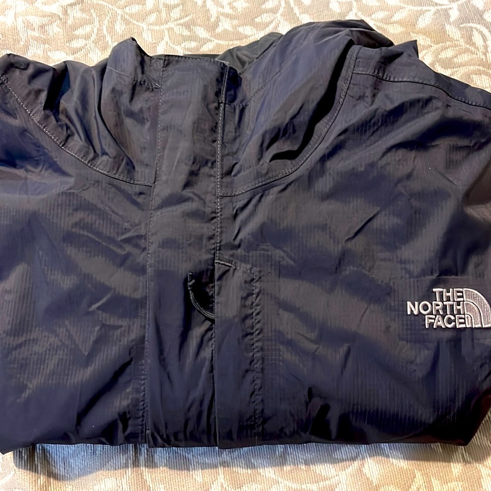 The North Face raincoat .North Face